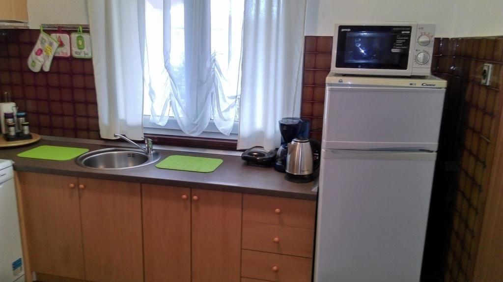 Rina Apartments ลาบิน ภายนอก รูปภาพ